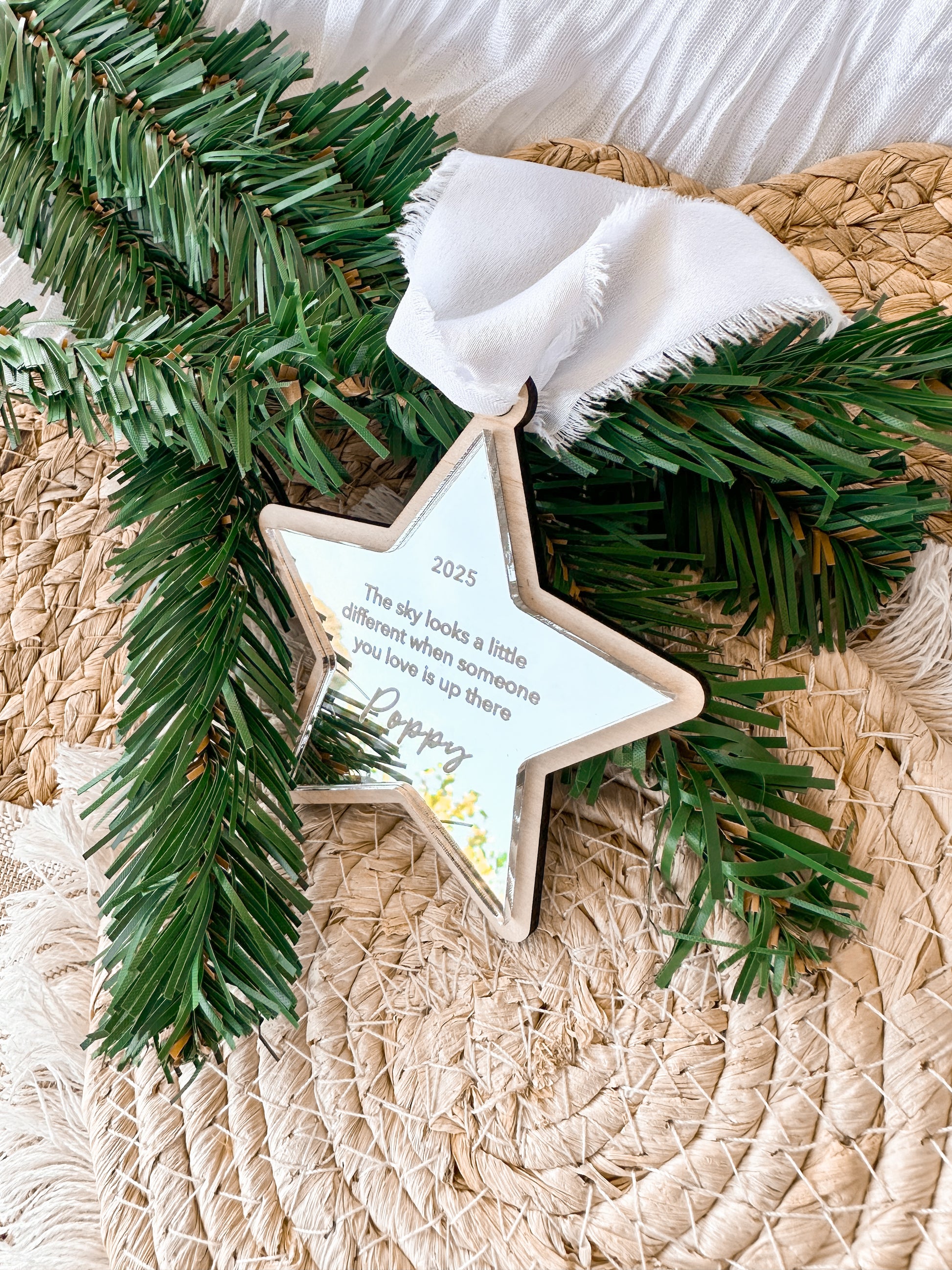Wooden star and moon-shaped personalised memorial ornaments with engraved text on mirror acrylic with white ribbon, custom christmas ornaments to remember family and lost loved ones, heaven memorial display christmas tree