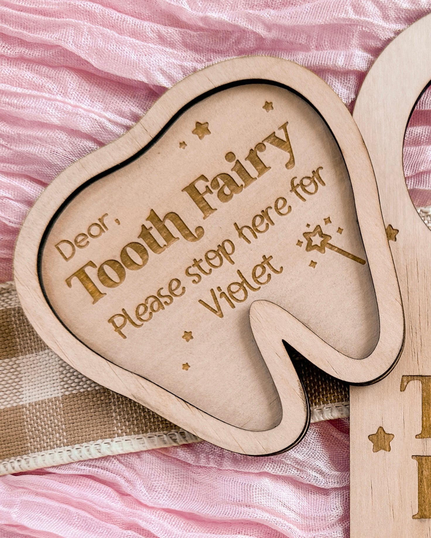 Wooden tooth-shaped plaque tray with 'Dear Tooth Fairy Please stop here' personalised text, engraved wooden dish