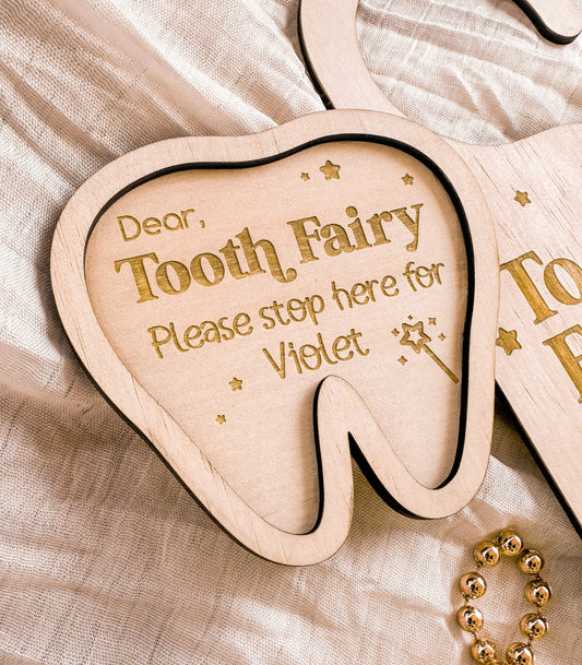 Wooden tooth-shaped plaque tray with 'Dear Tooth Fairy Please stop here' personalised text, engraved wooden dish