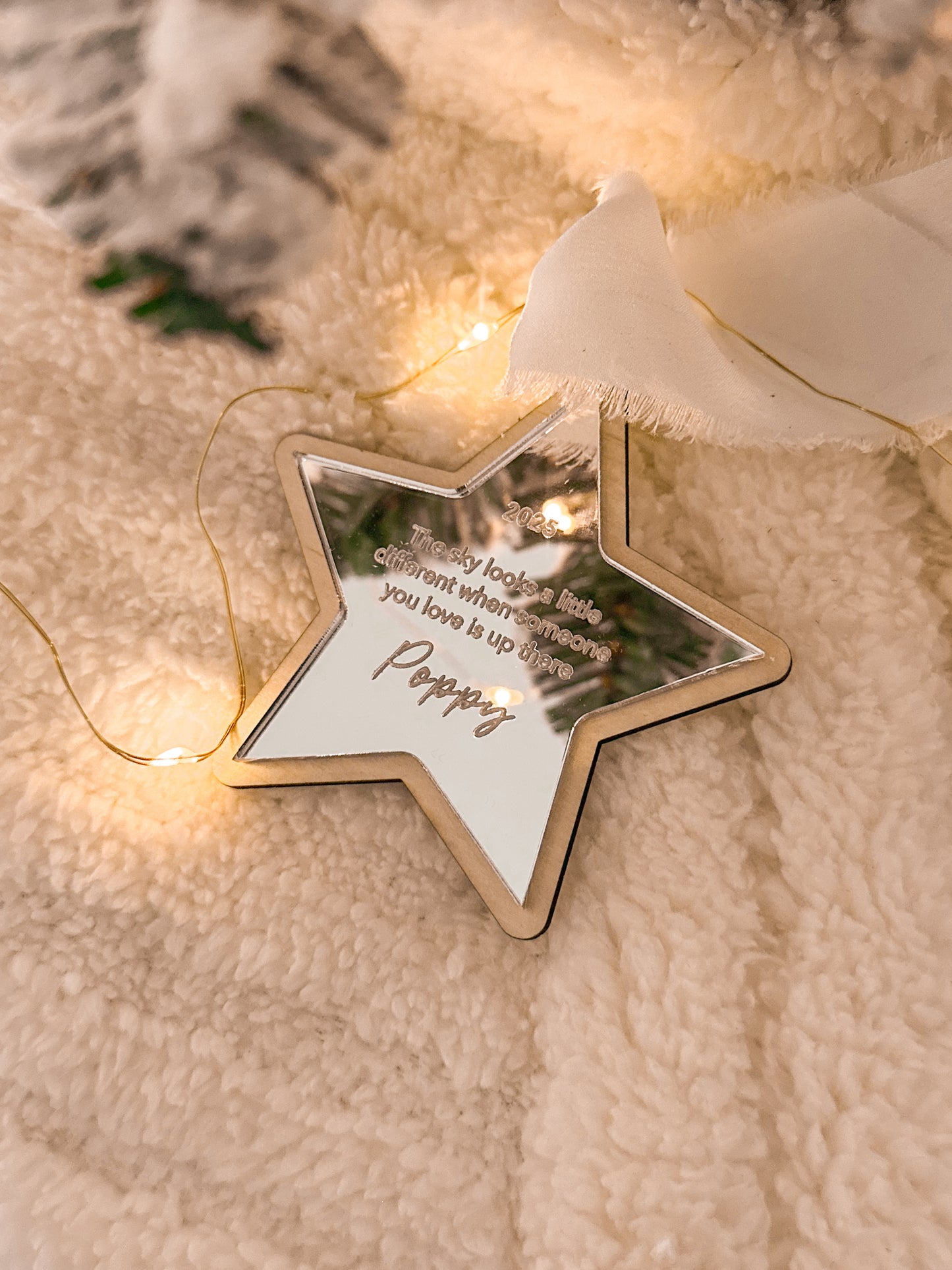 Wooden star and moon-shaped personalised memorial ornaments with engraved text on mirror acrylic with white ribbon, custom christmas ornaments to remember family and lost loved ones, heaven memorial display christmas tree