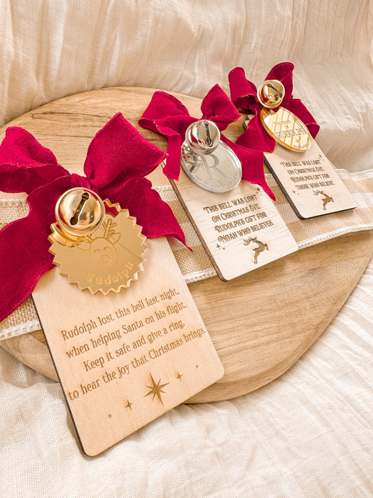 Rudolph's lost bell tags with decorative bell, red ribbon and wooden plaque that can be personalised