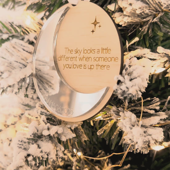 Wooden star and moon-shaped personalised memorial ornaments with engraved text on mirror acrylic with white ribbon, custom christmas ornaments to remember family and lost loved ones, heaven memorial display christmas tree