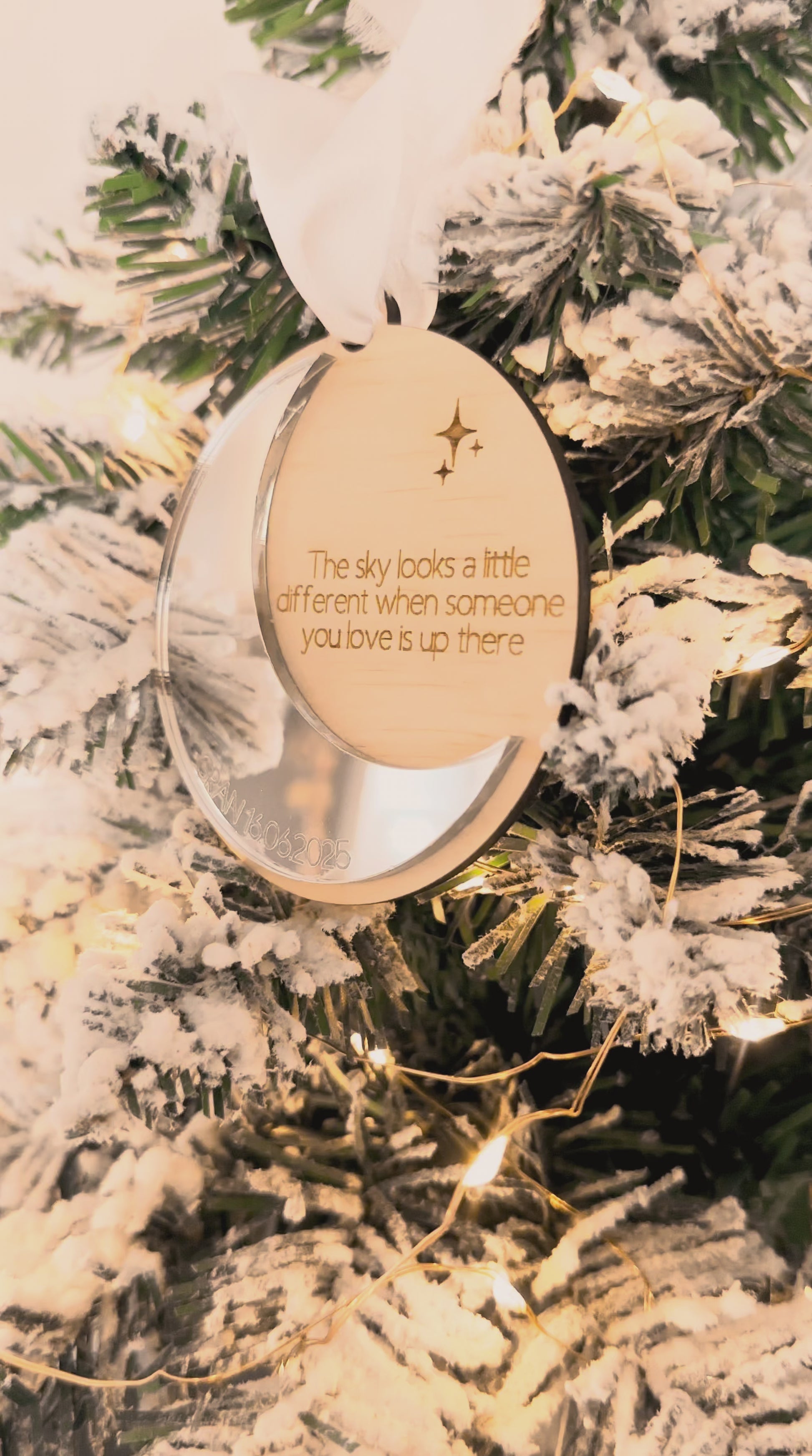 Wooden star and moon-shaped personalised memorial ornaments with engraved text on mirror acrylic with white ribbon, custom christmas ornaments to remember family and lost loved ones, heaven memorial display christmas tree
